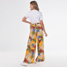 Laden Sie das Bild in den Galerie-Viewer, Loose boho style floral print bandaged summer holiday wear women trousers lady long casual pants
